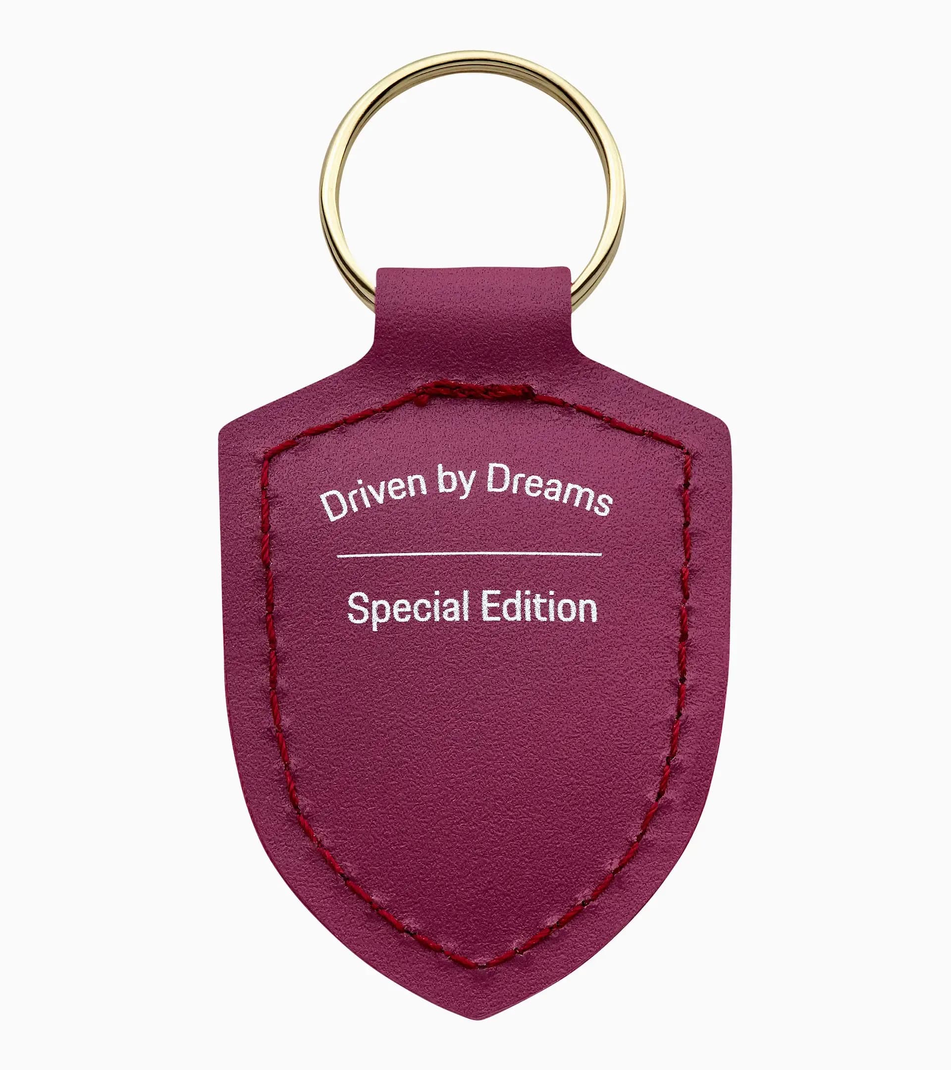 Porte-clés écusson « Driven by Dreams » – 75 ans thumbnail 1