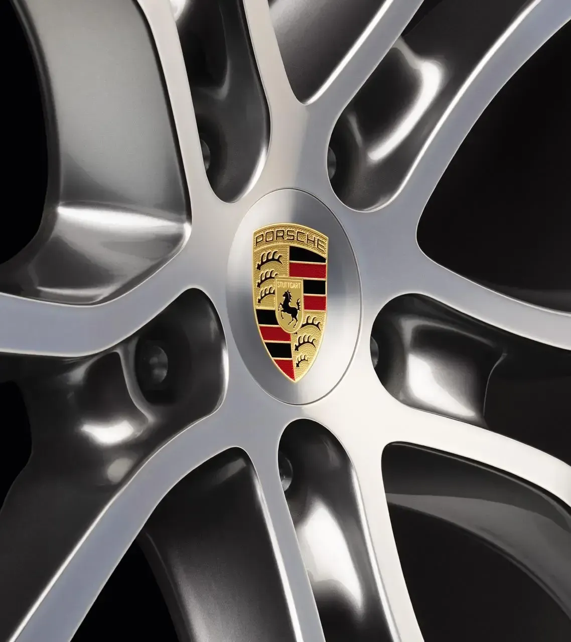 Navkapslar i platina (satinfinish) med färgat Porsche-emblem thumbnail 0