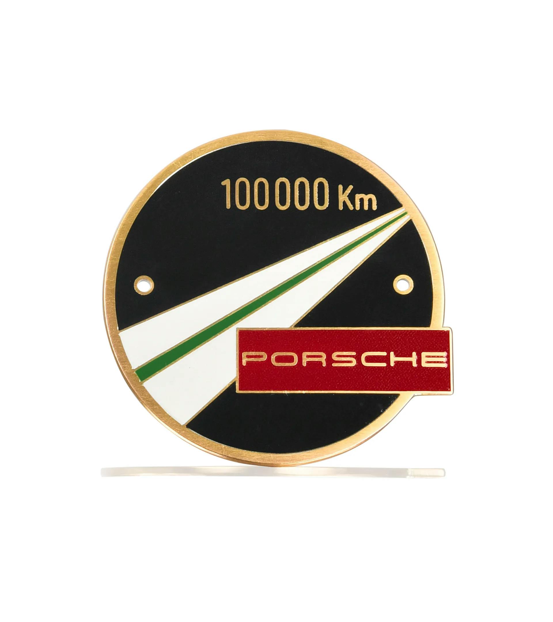 Porsche badge '100,000 km