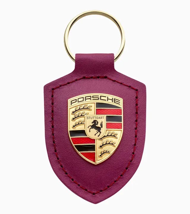 Porta-chaves com escudo "Driven by Dreams" – 75 anos