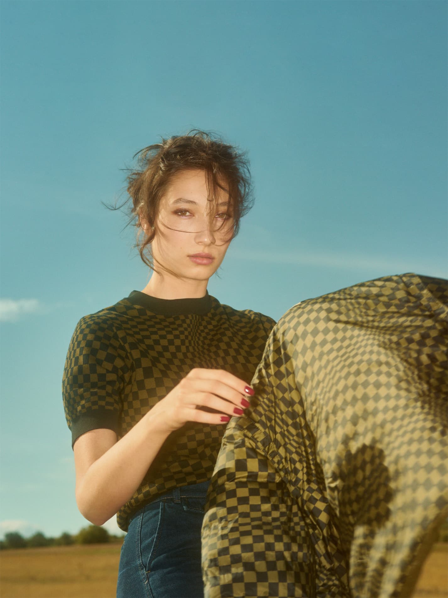 Woman in the focus wearing new Porsche clothing