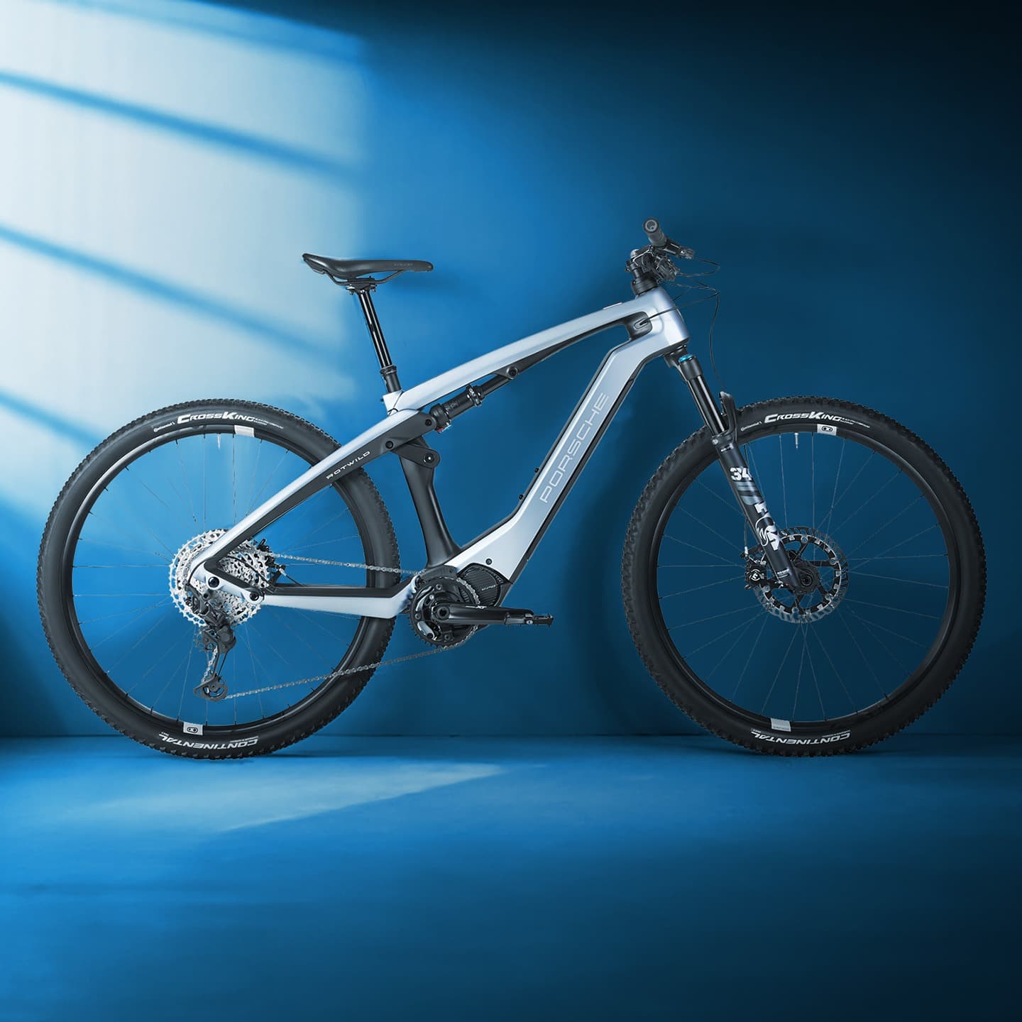 Porsche eBike in the focus on a blue background