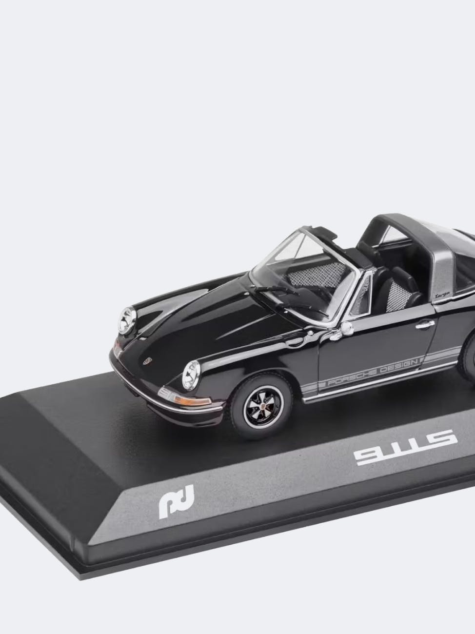 You can see a black model car from Porsche.