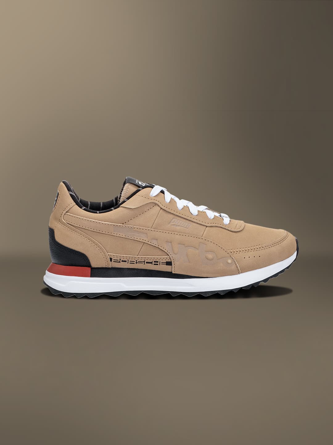 Brown colored sneaker on a brown background