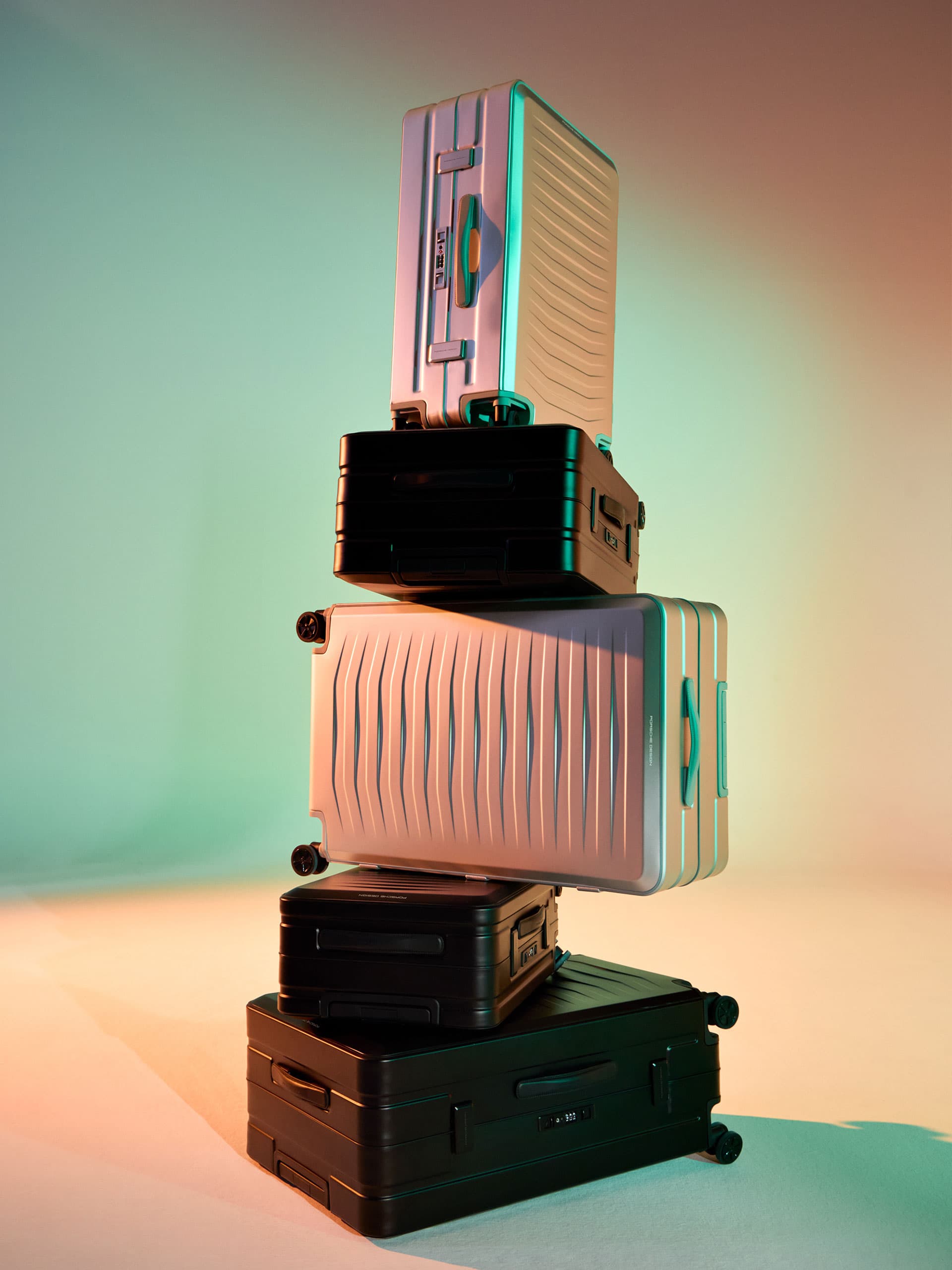 You can see different suitcases in different colours are stacked on top of each other