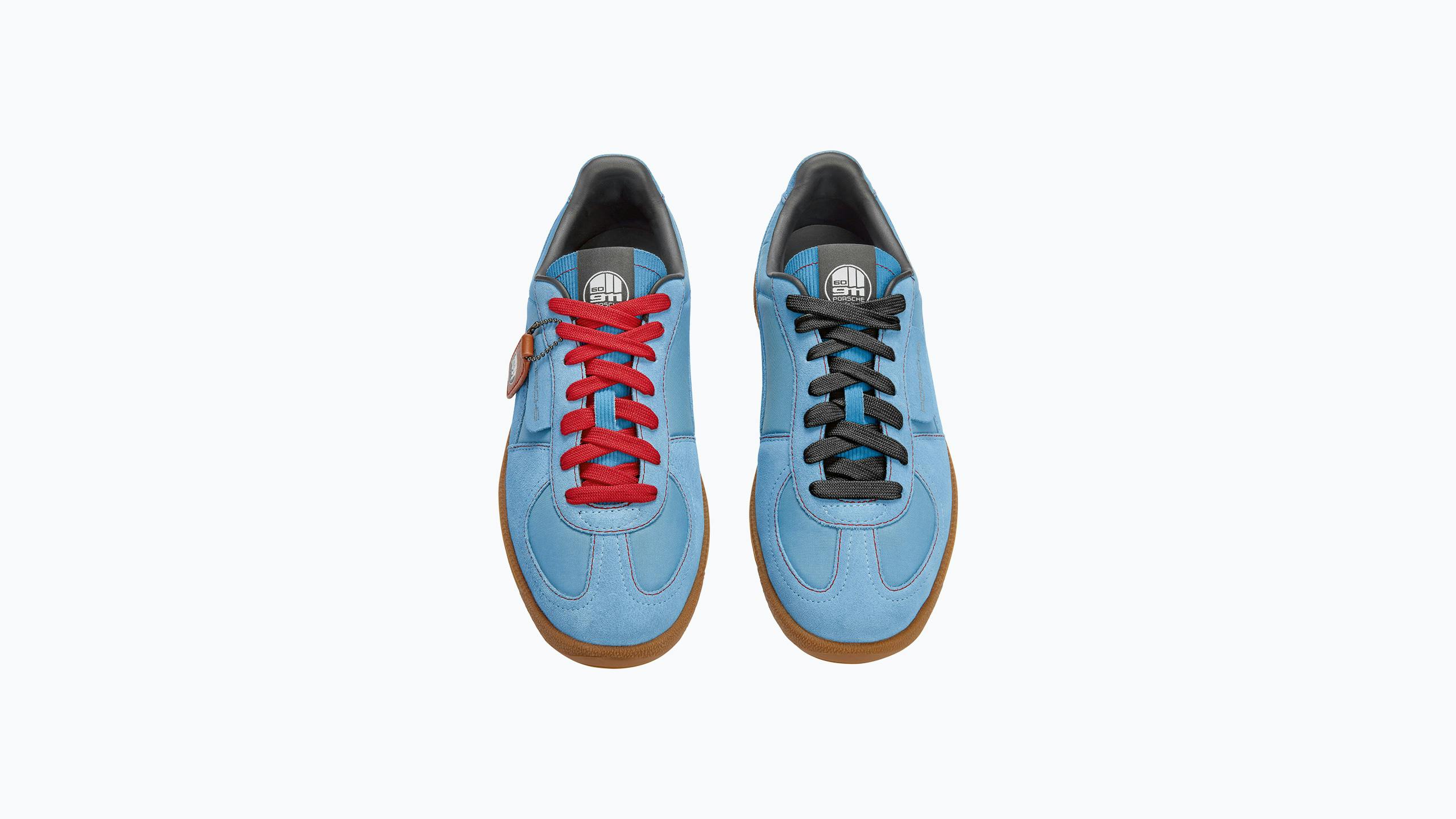 Pictured frontally is the light blue retro sneaker from Porsche in cooperation with Puma.
