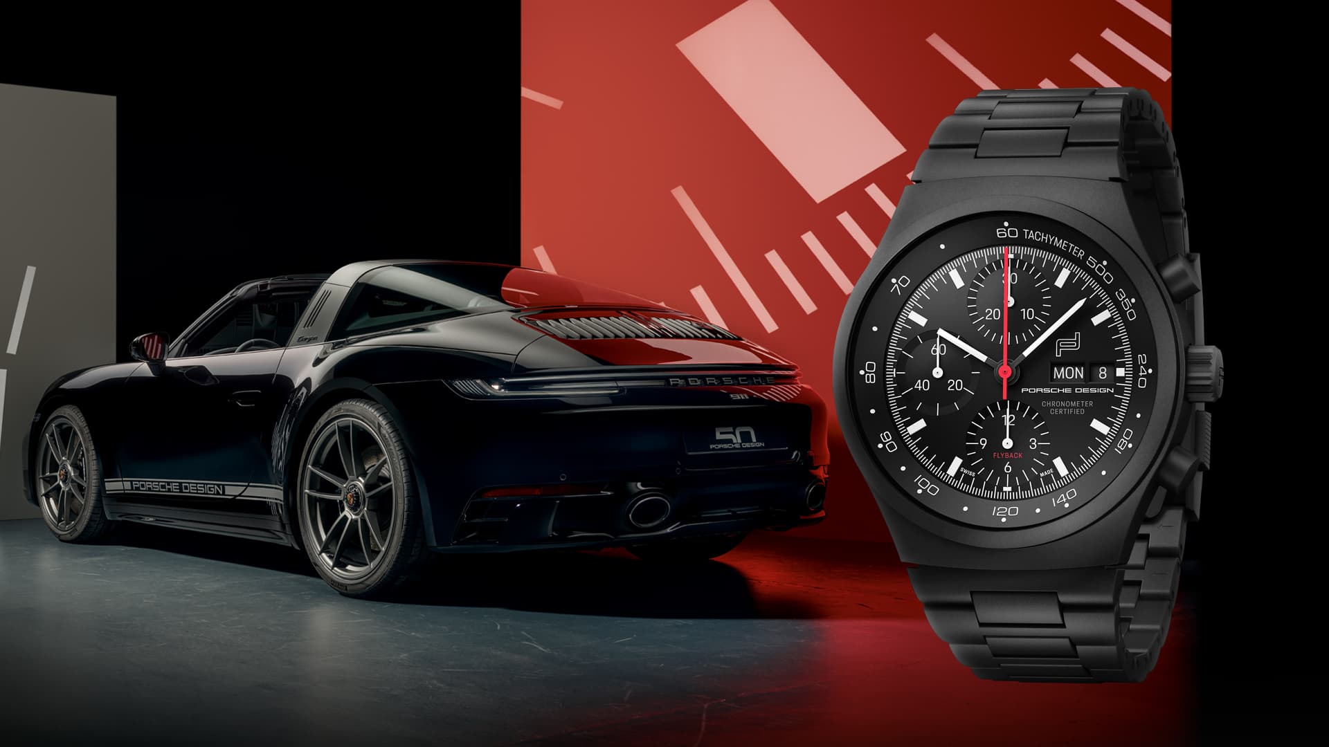 Pictured is the Chronograph 911 50 Years Edition in black and in the background is a black Porsche 911