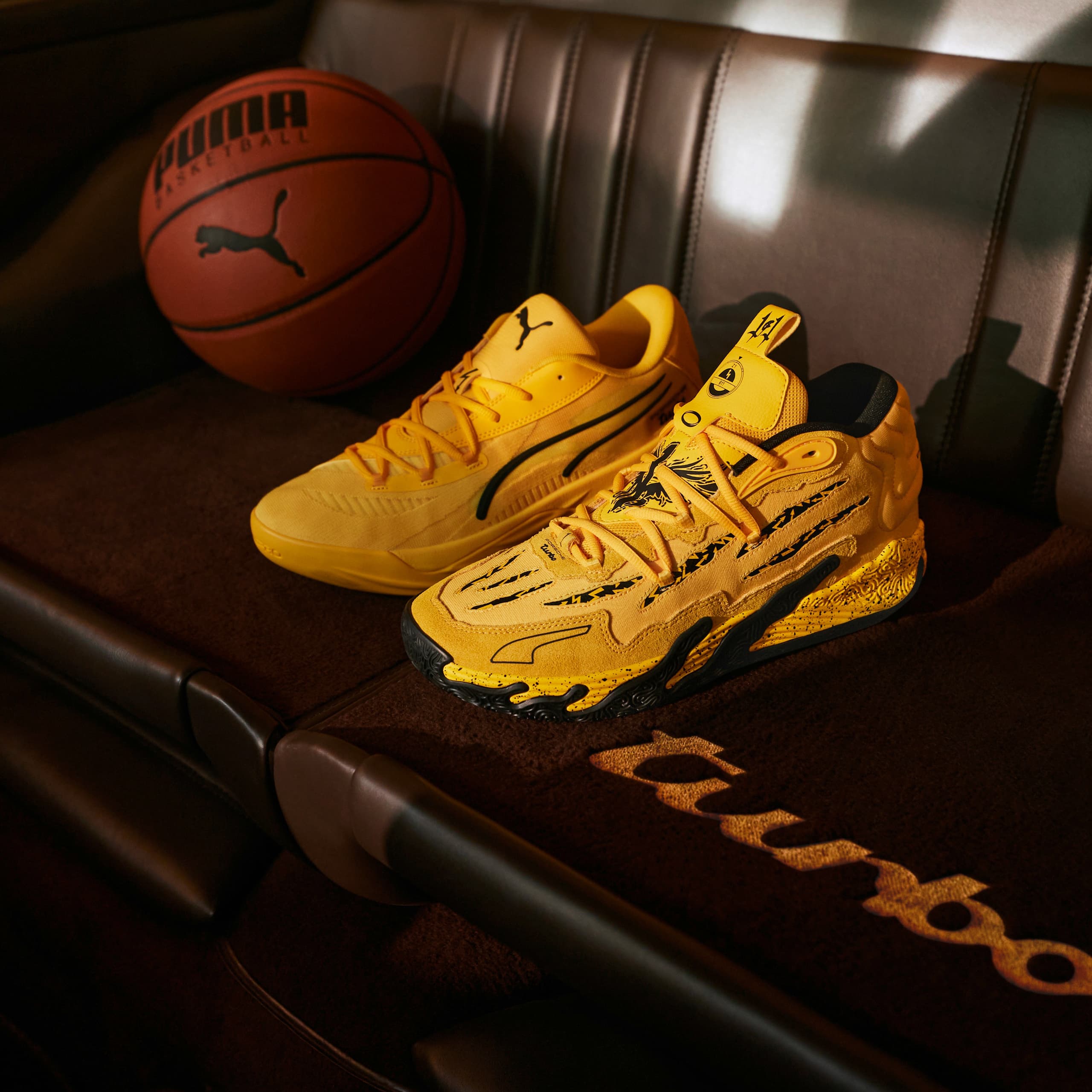 The image contains a pair of basketball shoes placed on a bench.