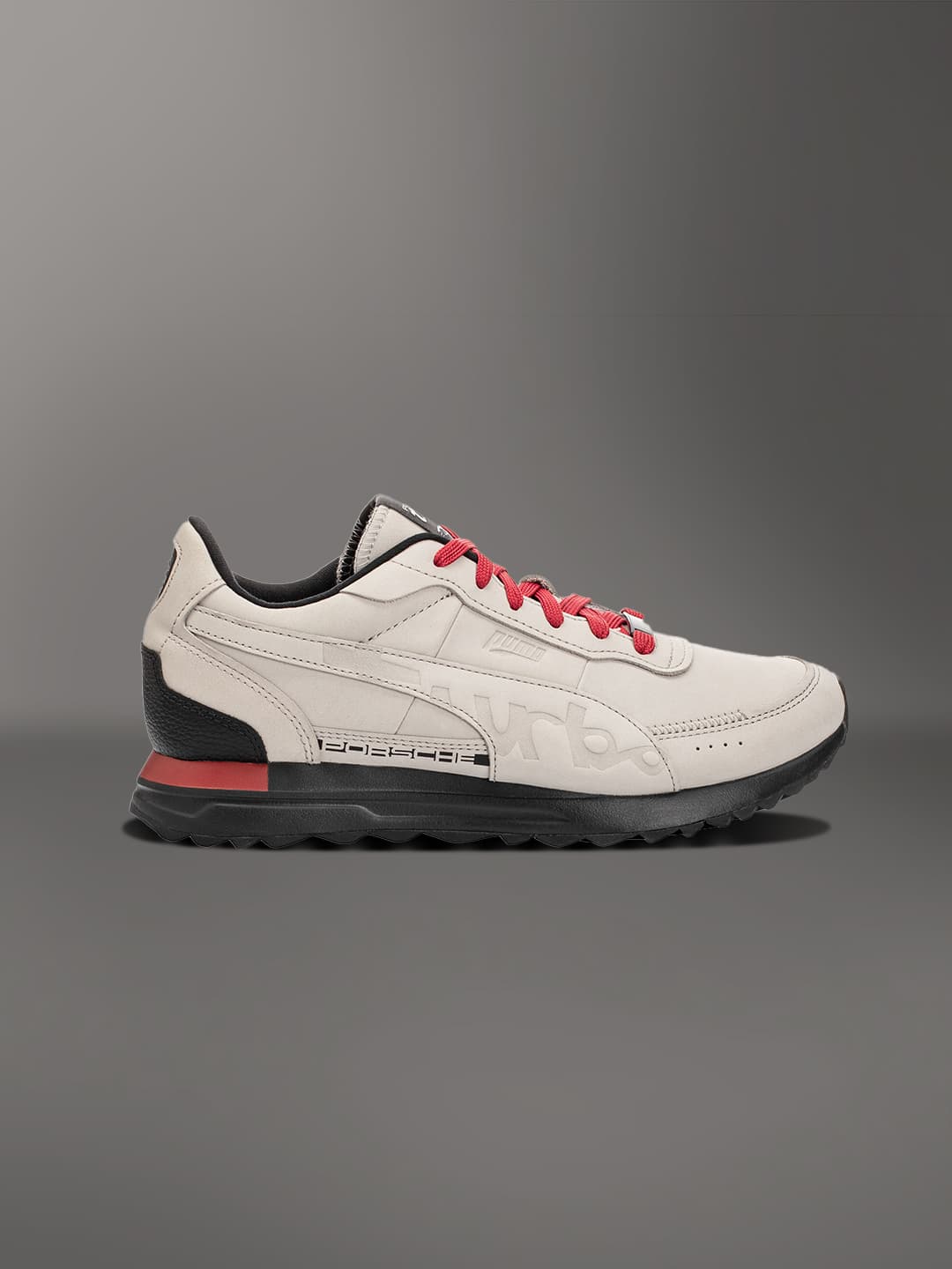 Light grey colored sneaker on a light grey background