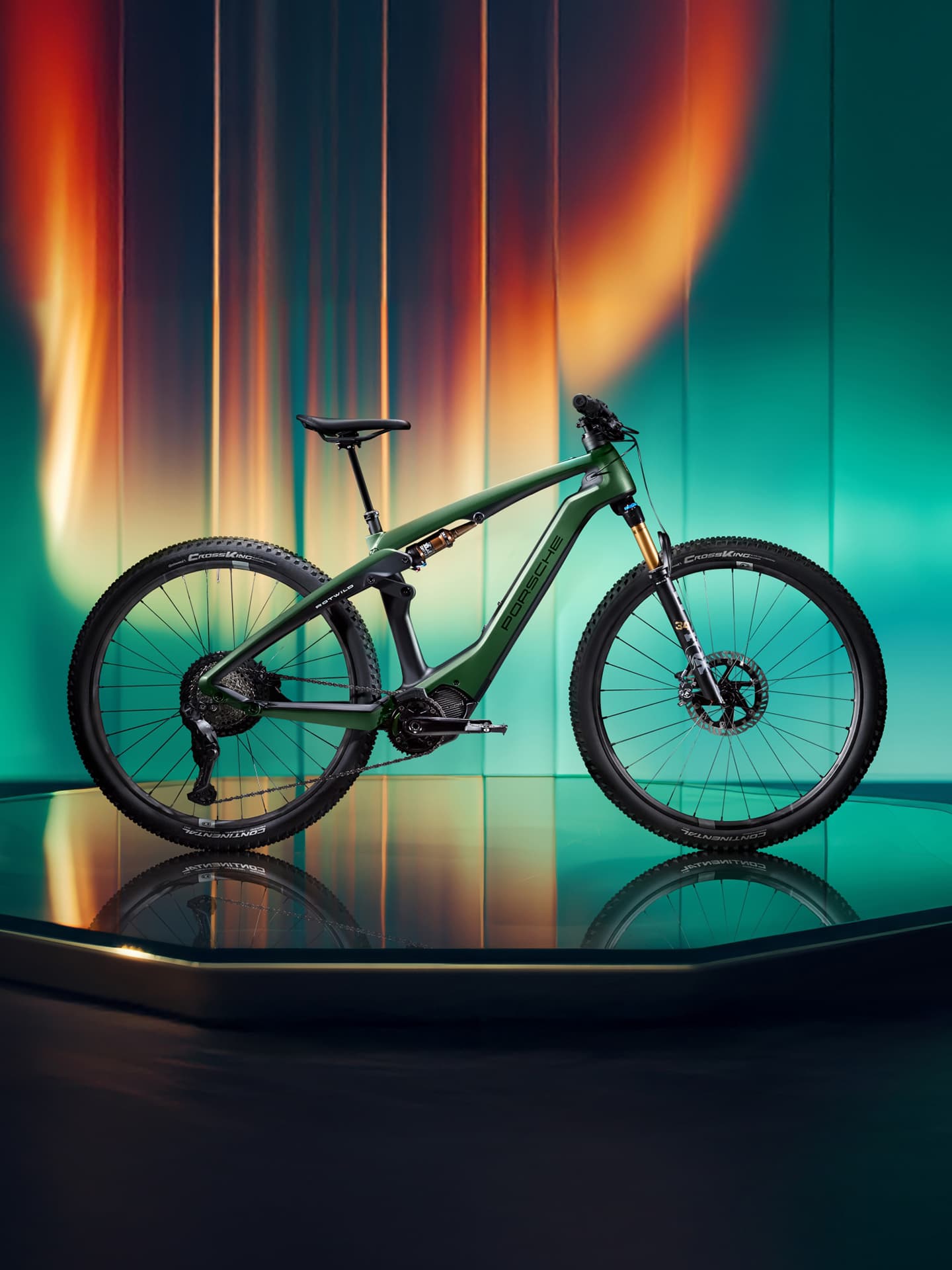 Porsche eBike in the focus, with a green and orange background