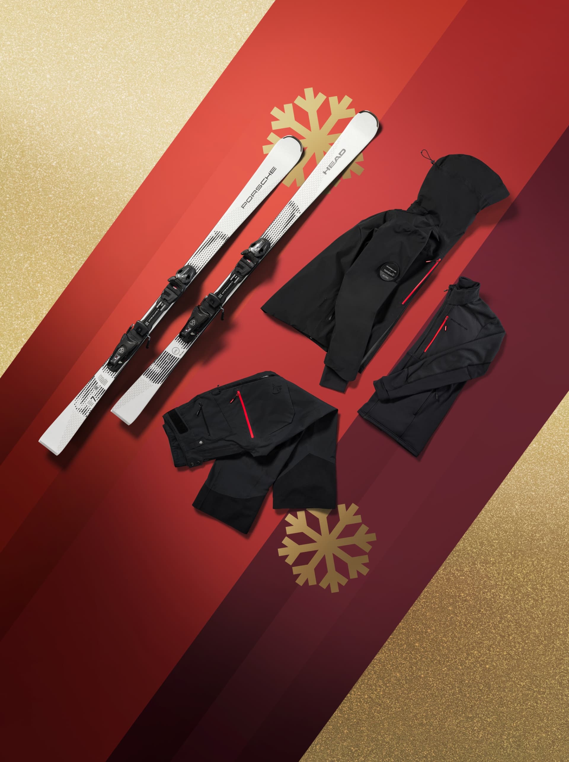 Set van winterjas en broek en ski's op rode en gouden achtergrond