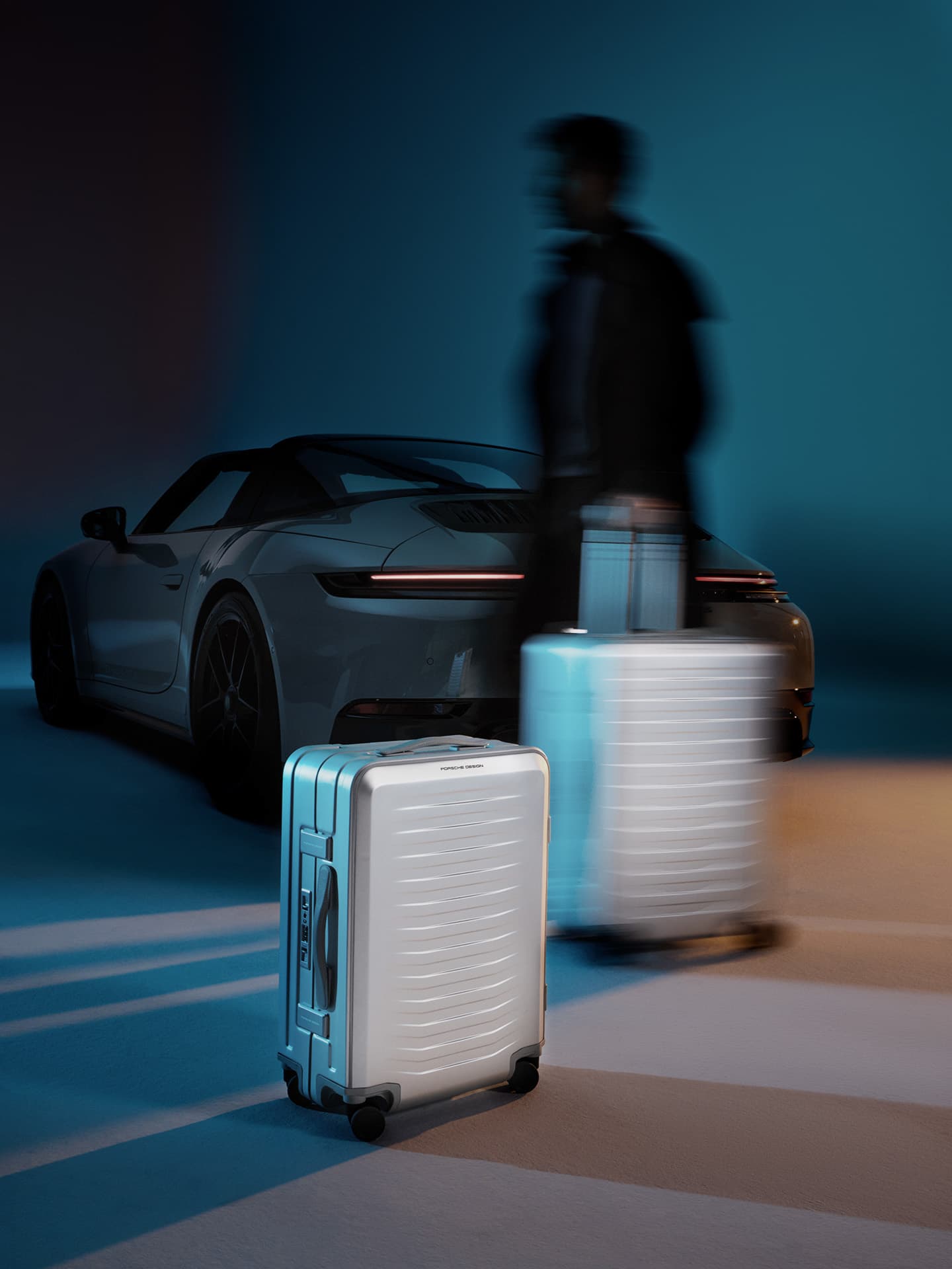 Roadster Aluminum Trolley Cabin Size, Porsche car and man carring other trolley in background