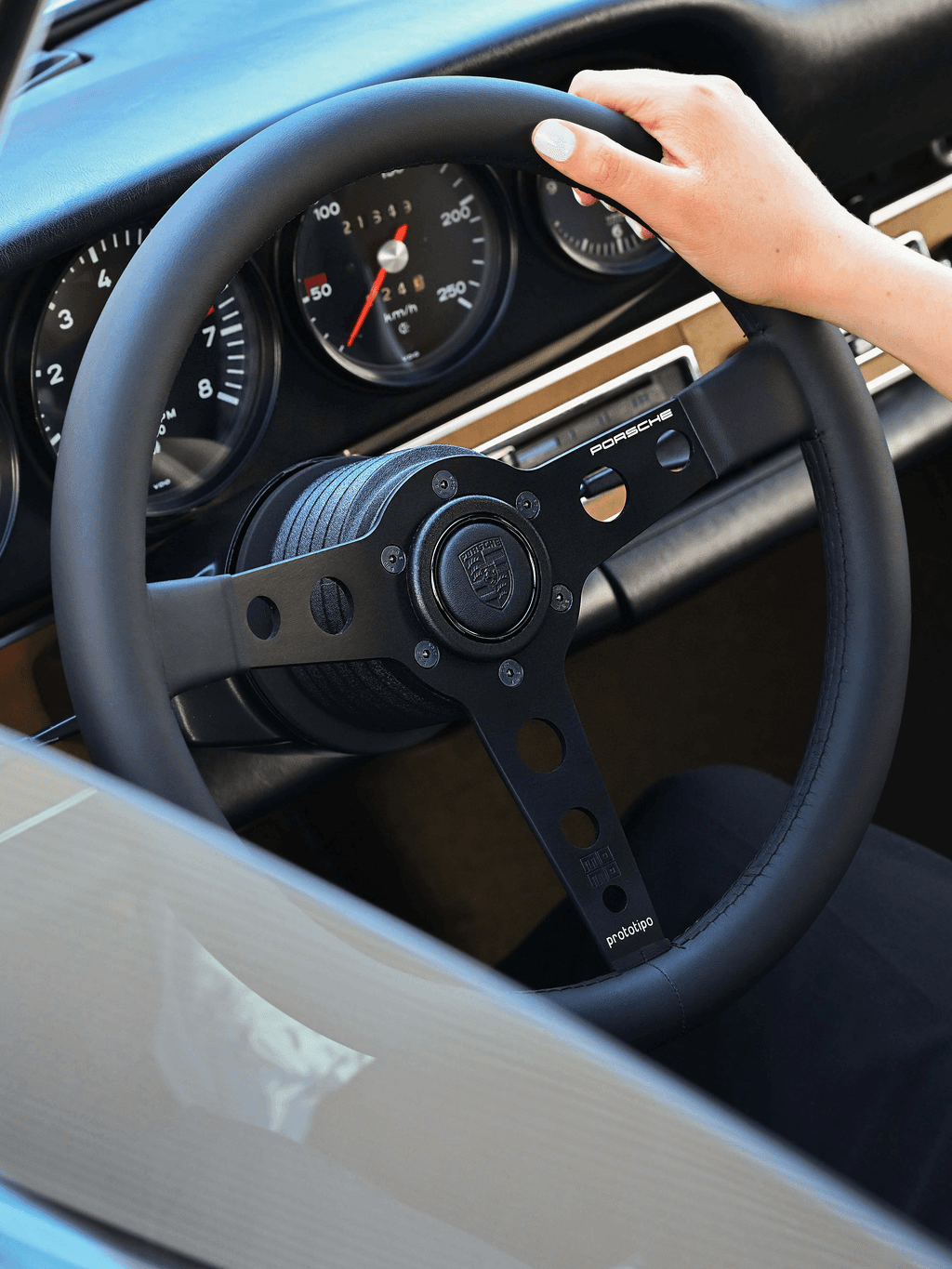 close up of a Porsche Classic steering wheel in a historic car