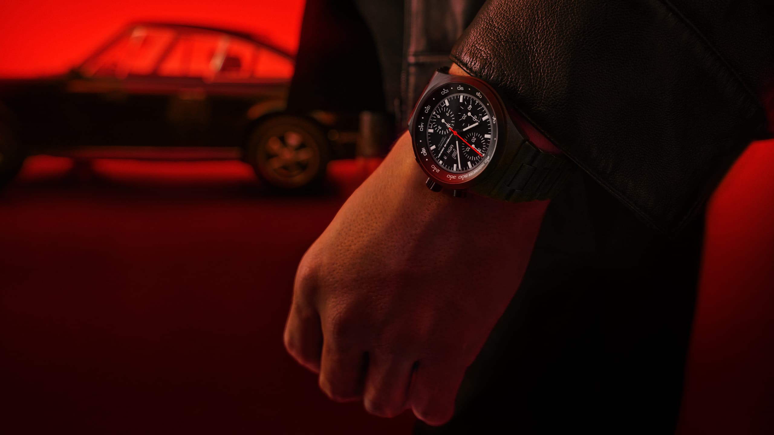 Detail view of Porsche Design custom-build Timepiece with red wristband