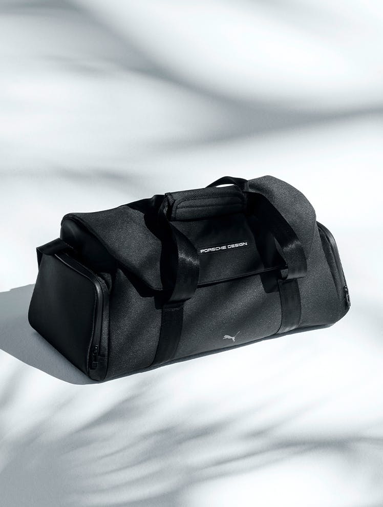 Shown is a black training bag from Porsche.