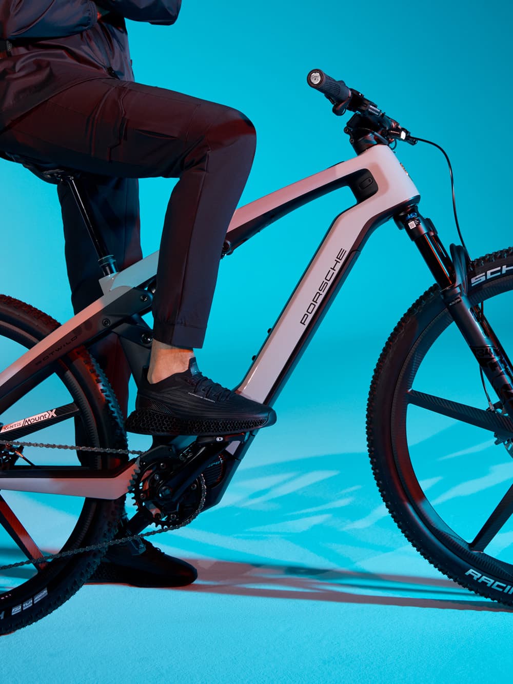close up of a Porsche eBike in a blue environment