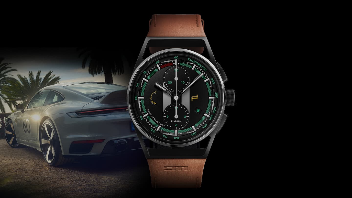 Pictured is the Chronograph 911 Sport Classic with brown leather strap and a Porsche 911 in the background