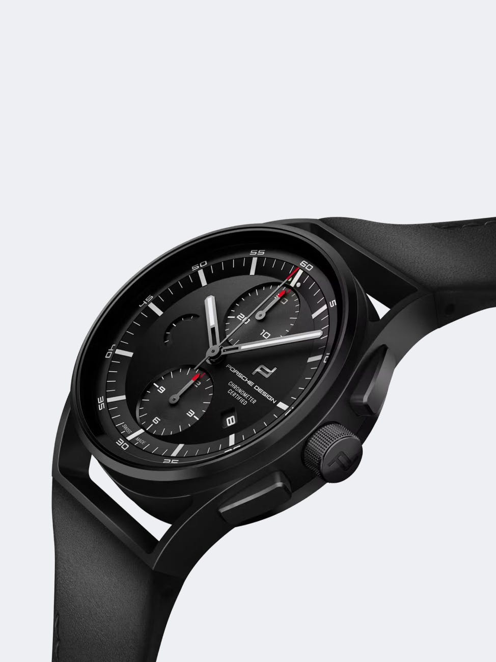 You can see a black wristwatch from Porsche.
