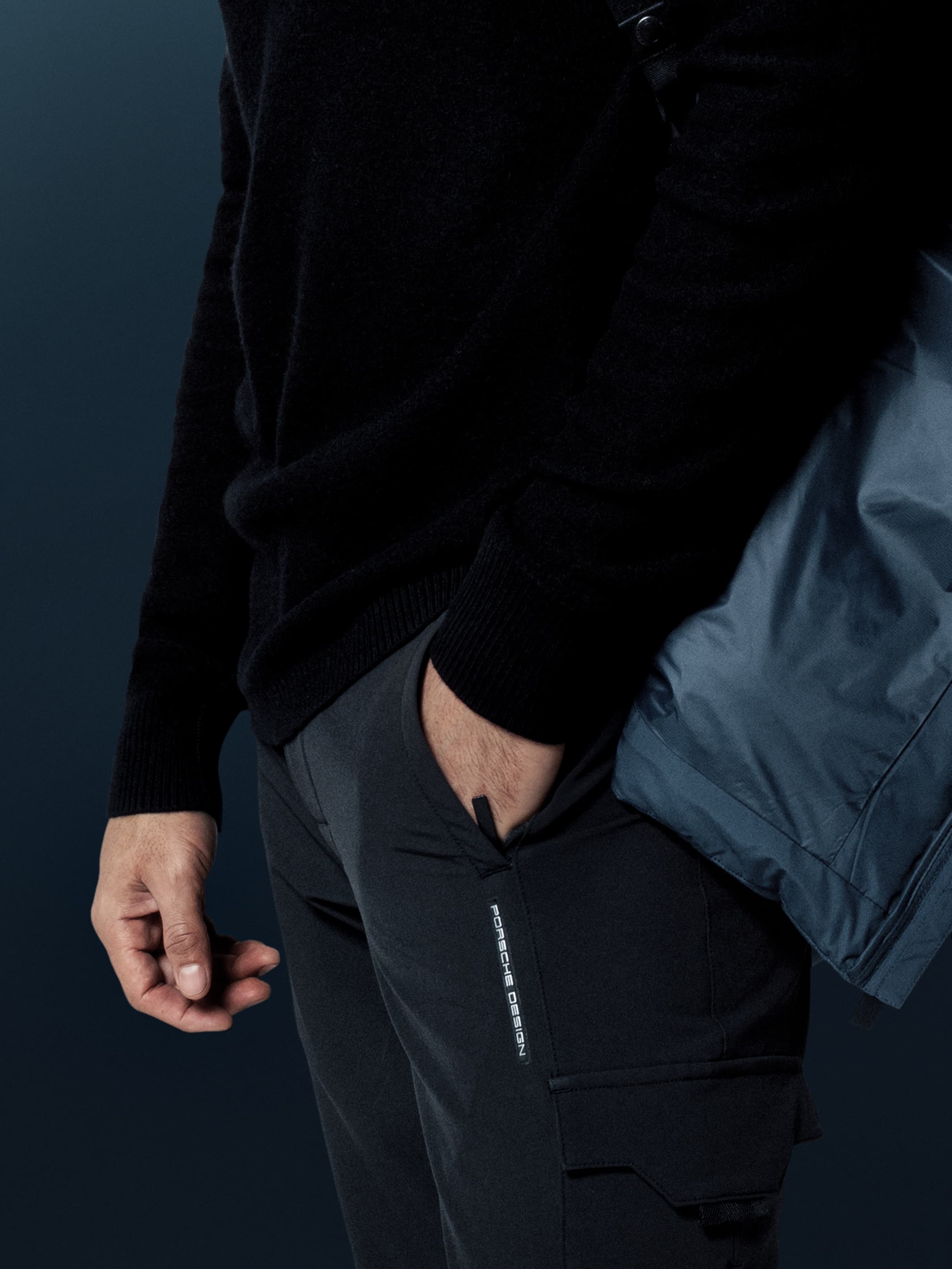 Detailshof of man wearing a Porsche Design pants