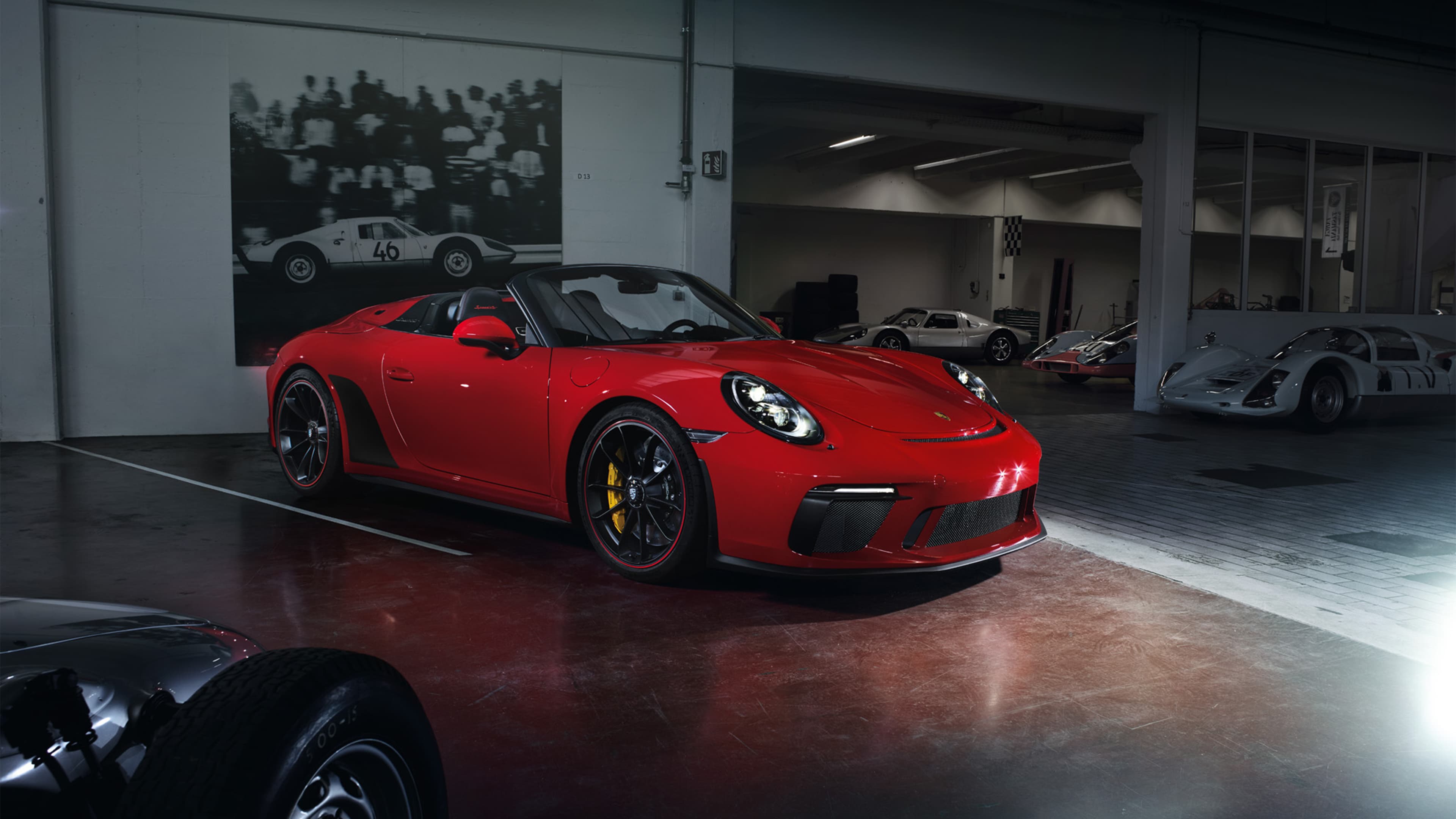 Pictured is a red Porsche 911 Speedster