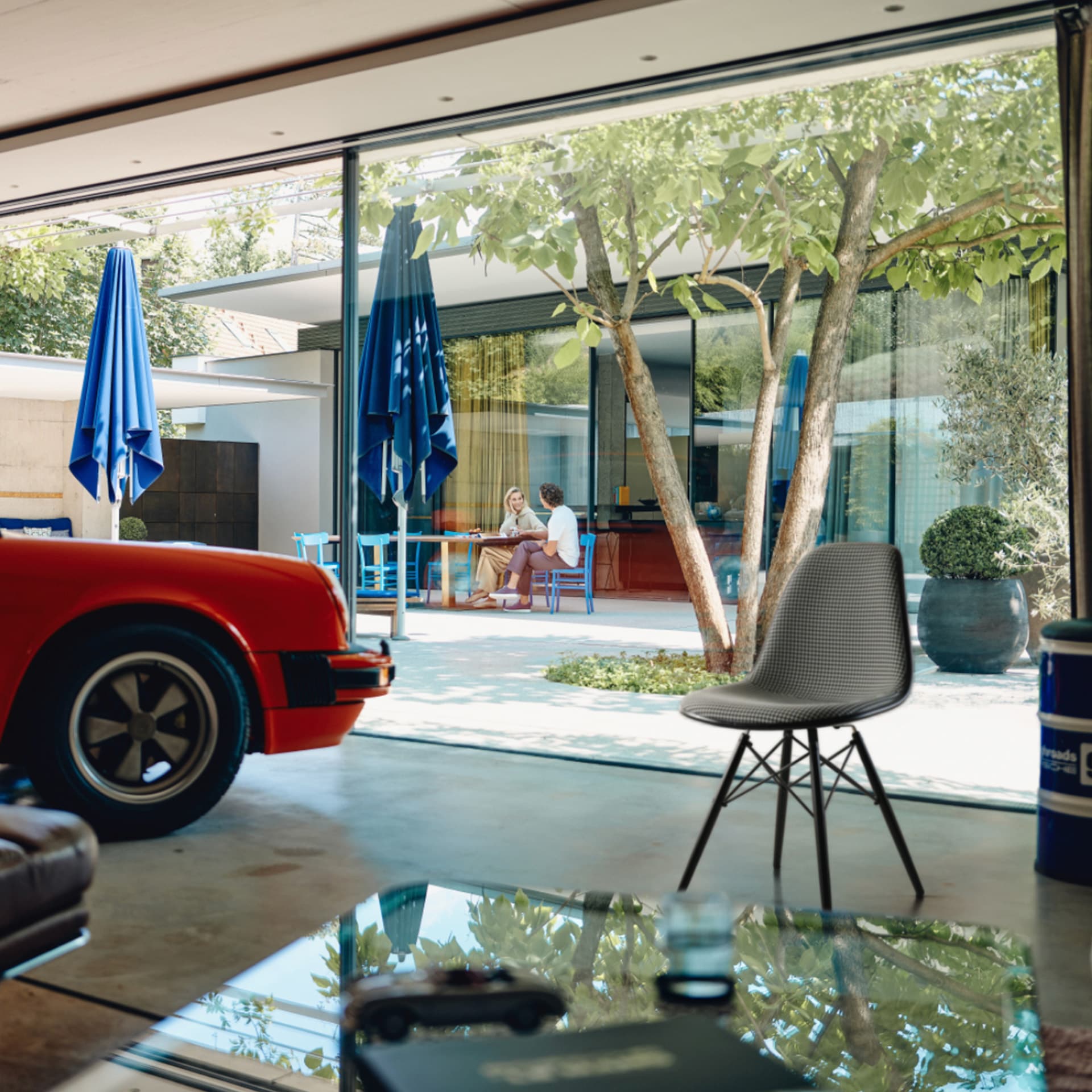 View into a room with the Vitra Eames Chair in the focus