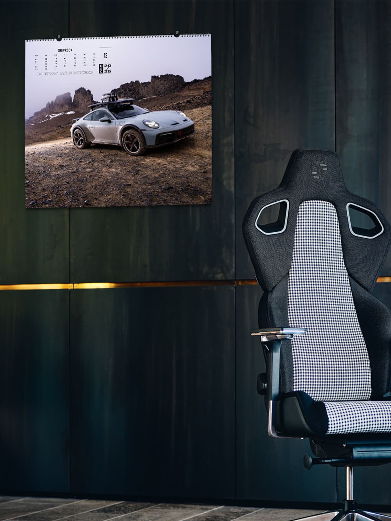 You can see a Vitra for Porsche chair in the focus and a wall calendar in the background