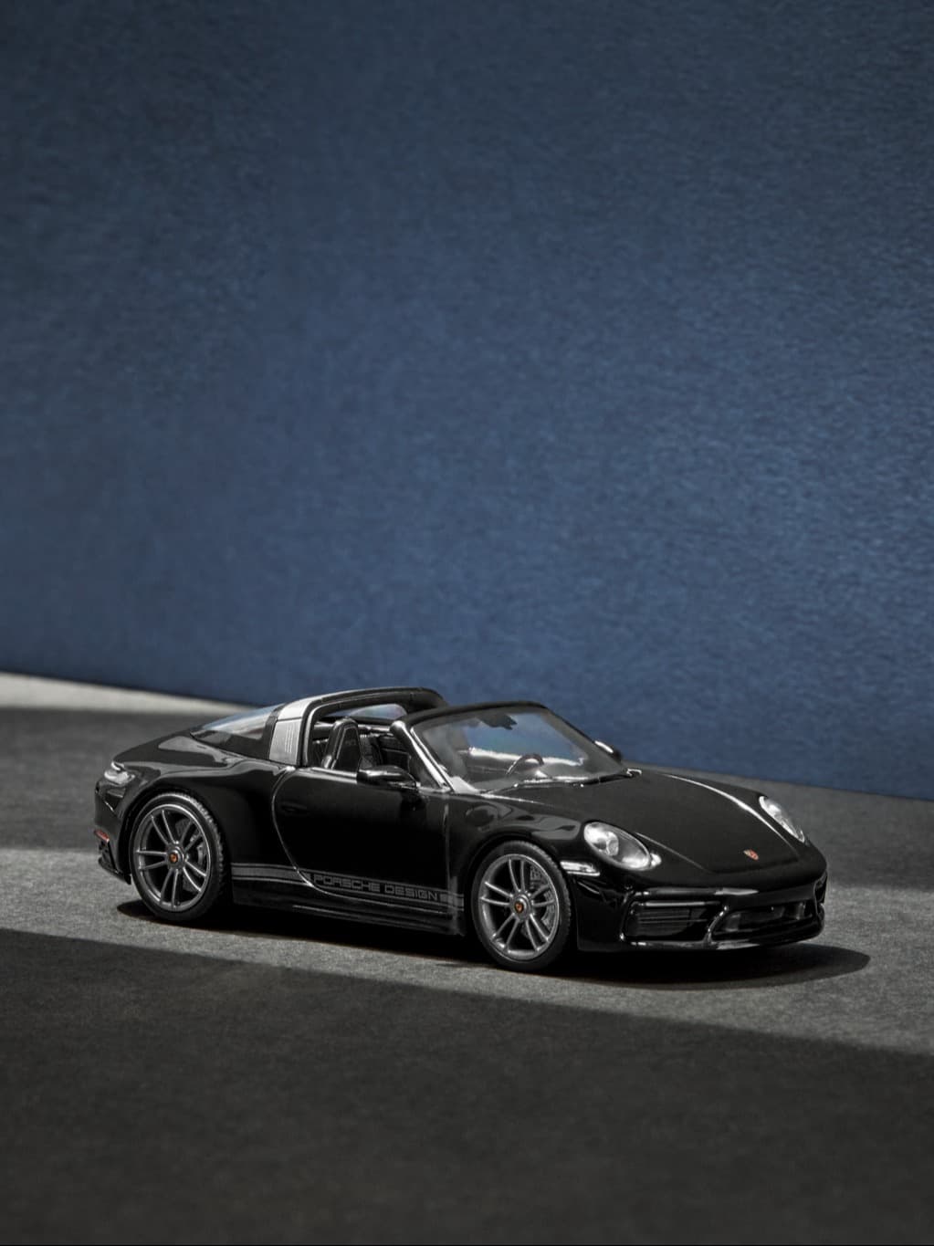 Close up of a black Porsche 911 model car