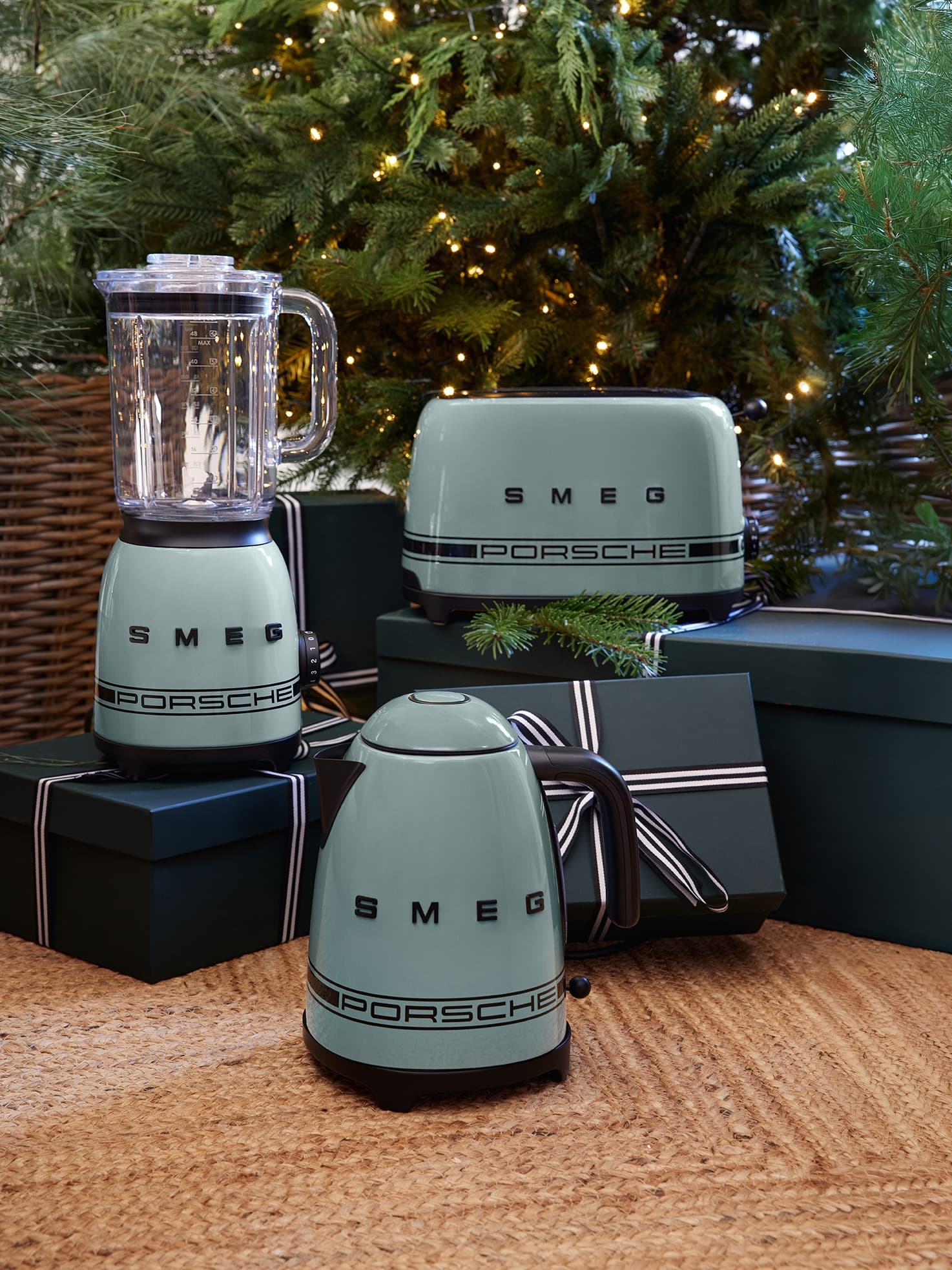 White Porsche skis and black ski gear on red and gold background with snowflake design