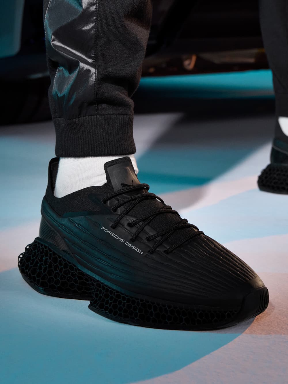 Close-up of man wearing Porsche Design 3D Matrix in black