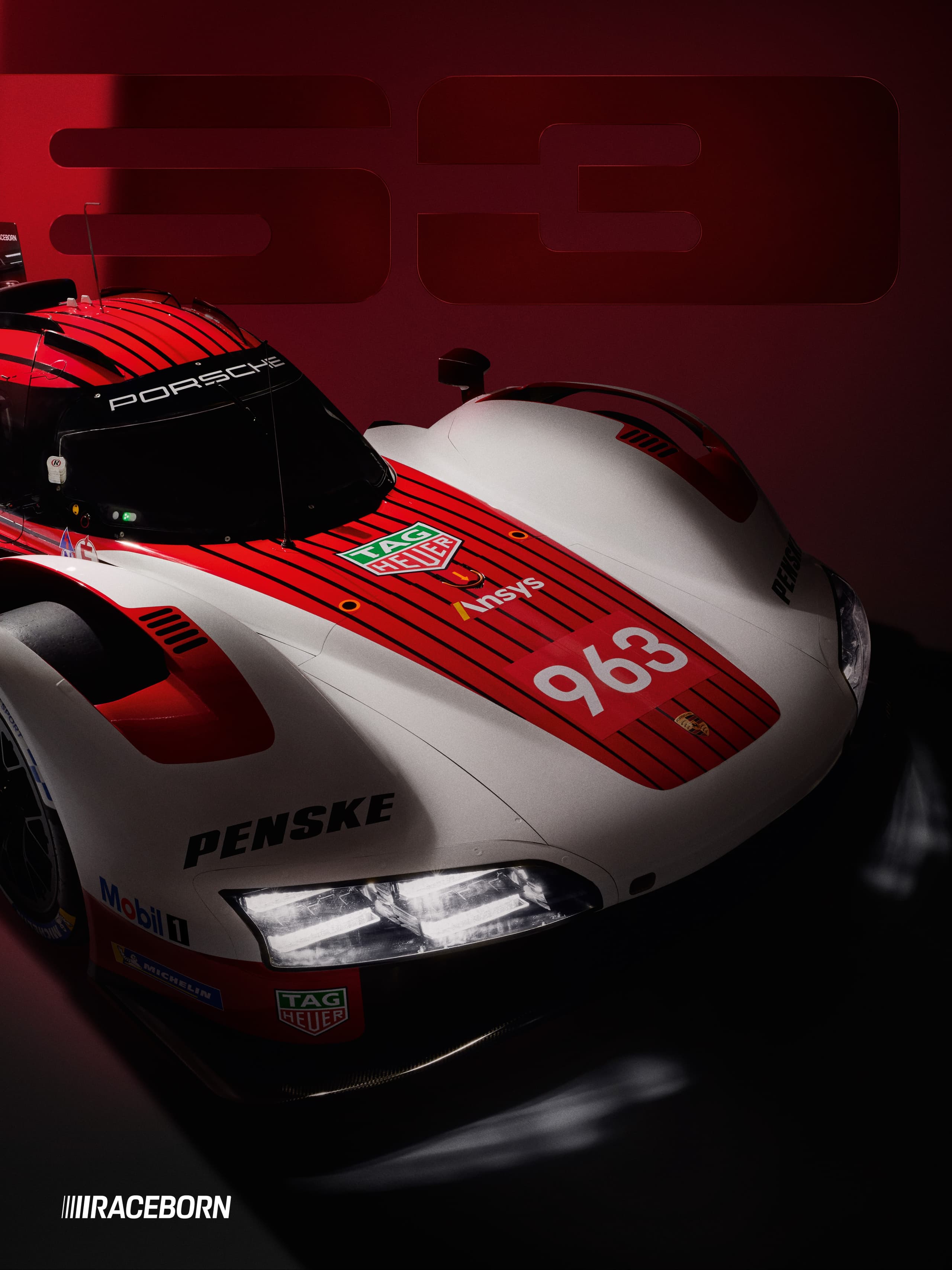 White Porsche race car with gold wheels, red and blue accents, next to a matching barrel with number 26 on a dark background.