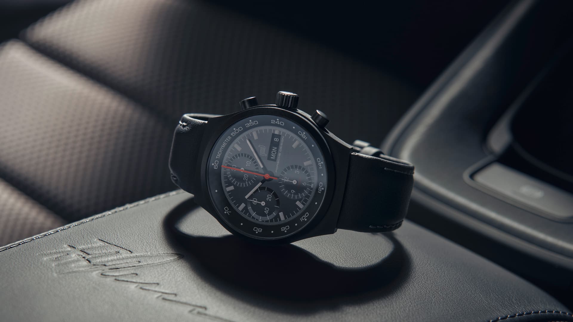 Pictured is a black Sport Chrono wristwatch from Porsche