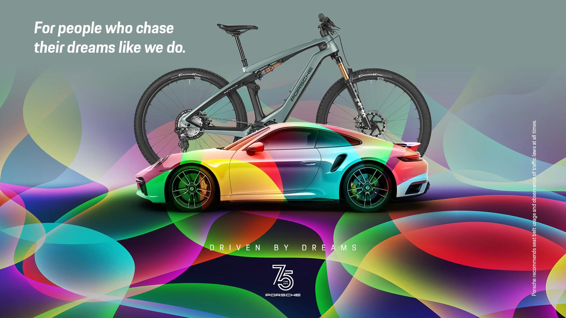 On a colorful background with a gray-black filter is a colorful Porsche 911 with the white lettering "For people who chase their dreams like we do" in the top left corner. In the background of the Porsche 911 there is a Porsche ebike.
