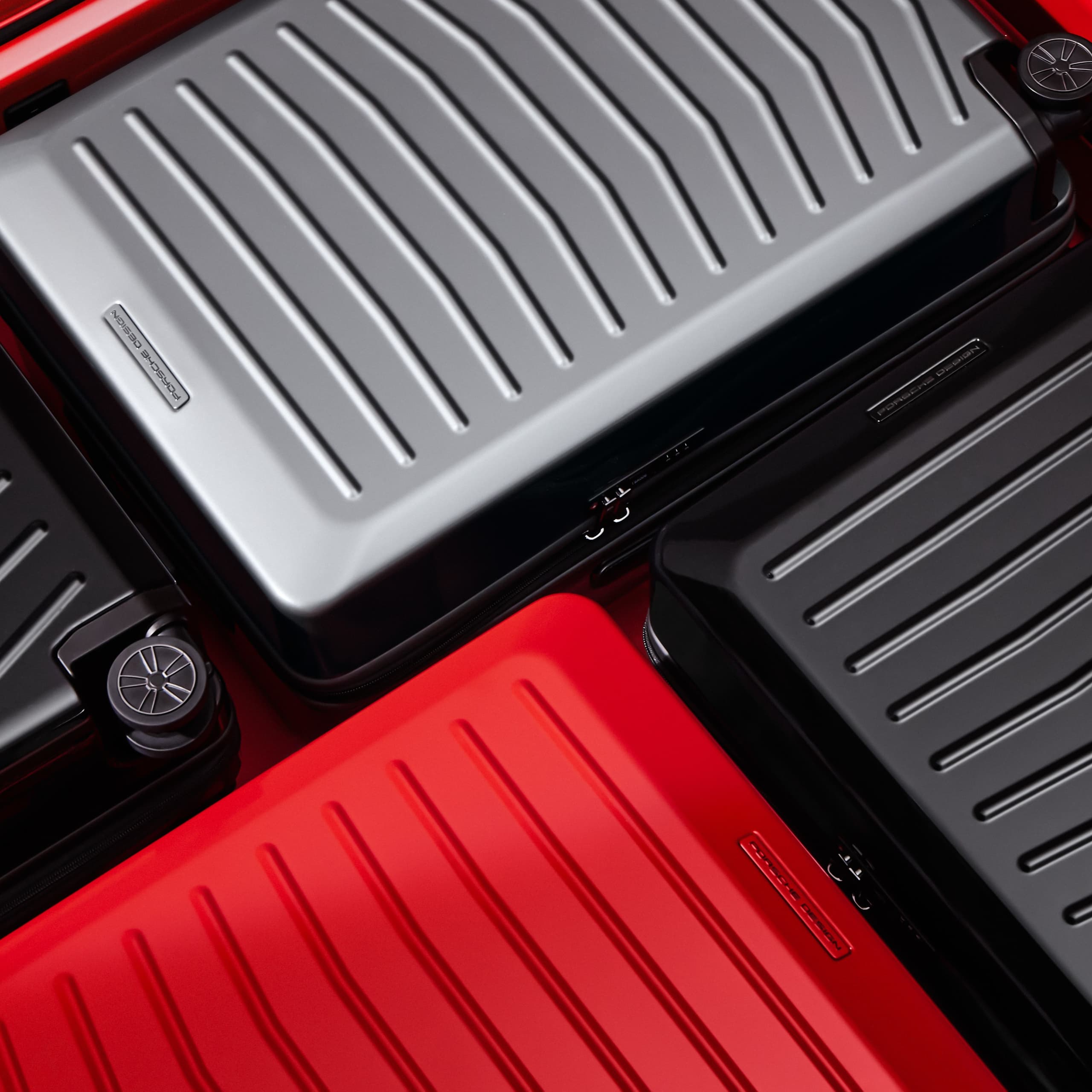 You can see different Porsche Design Hardcase trolleys next to each other