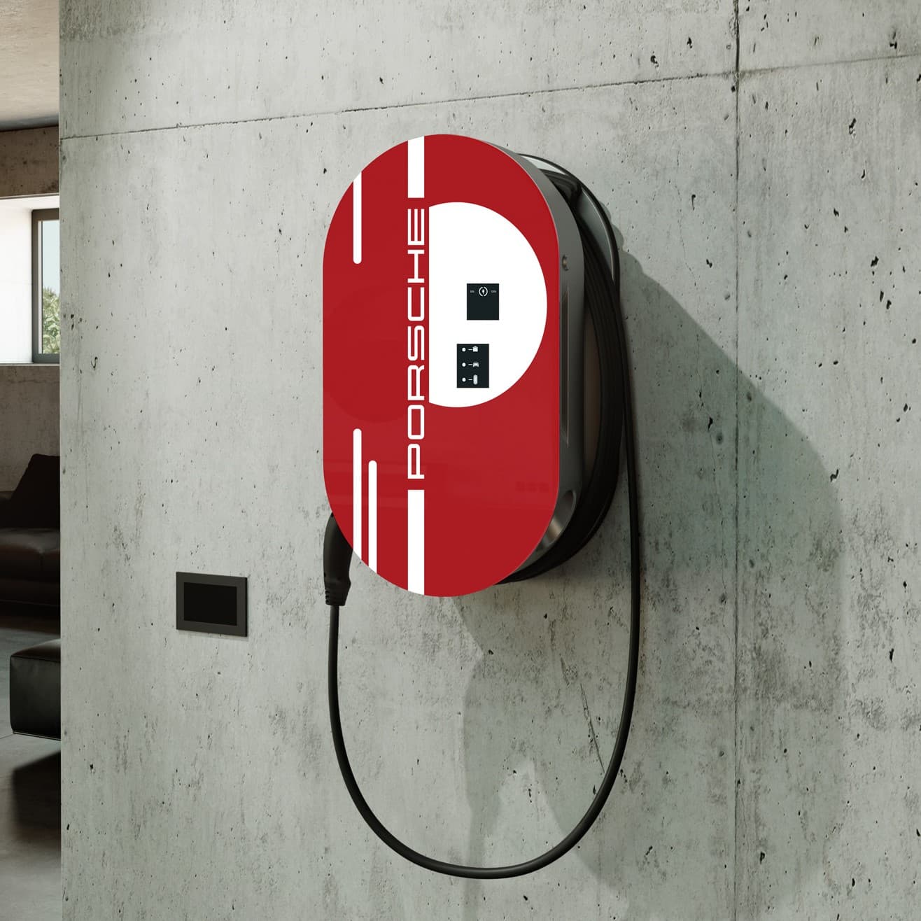Red Porsche wall charger on concrete wall, featuring sleek design with black cable and modern aesthetic.
