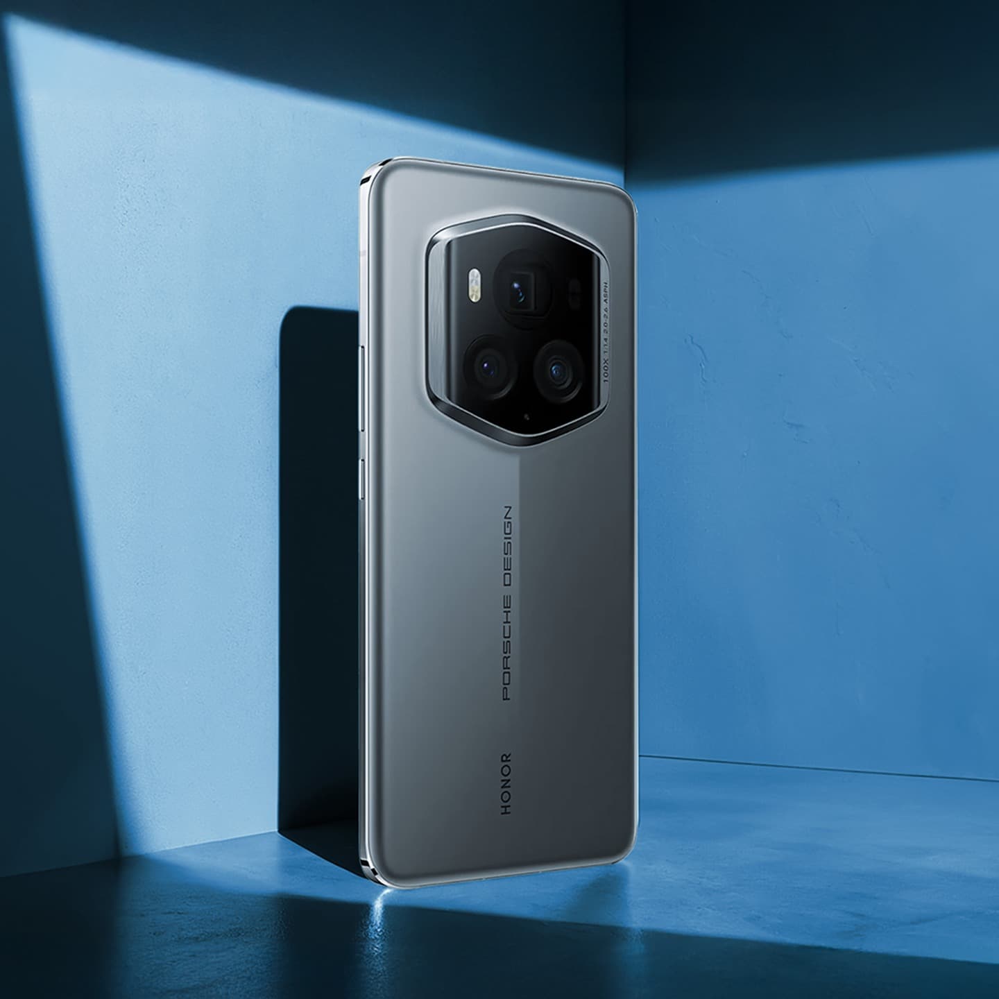 Porsche smartphone in the focus on a blue background
