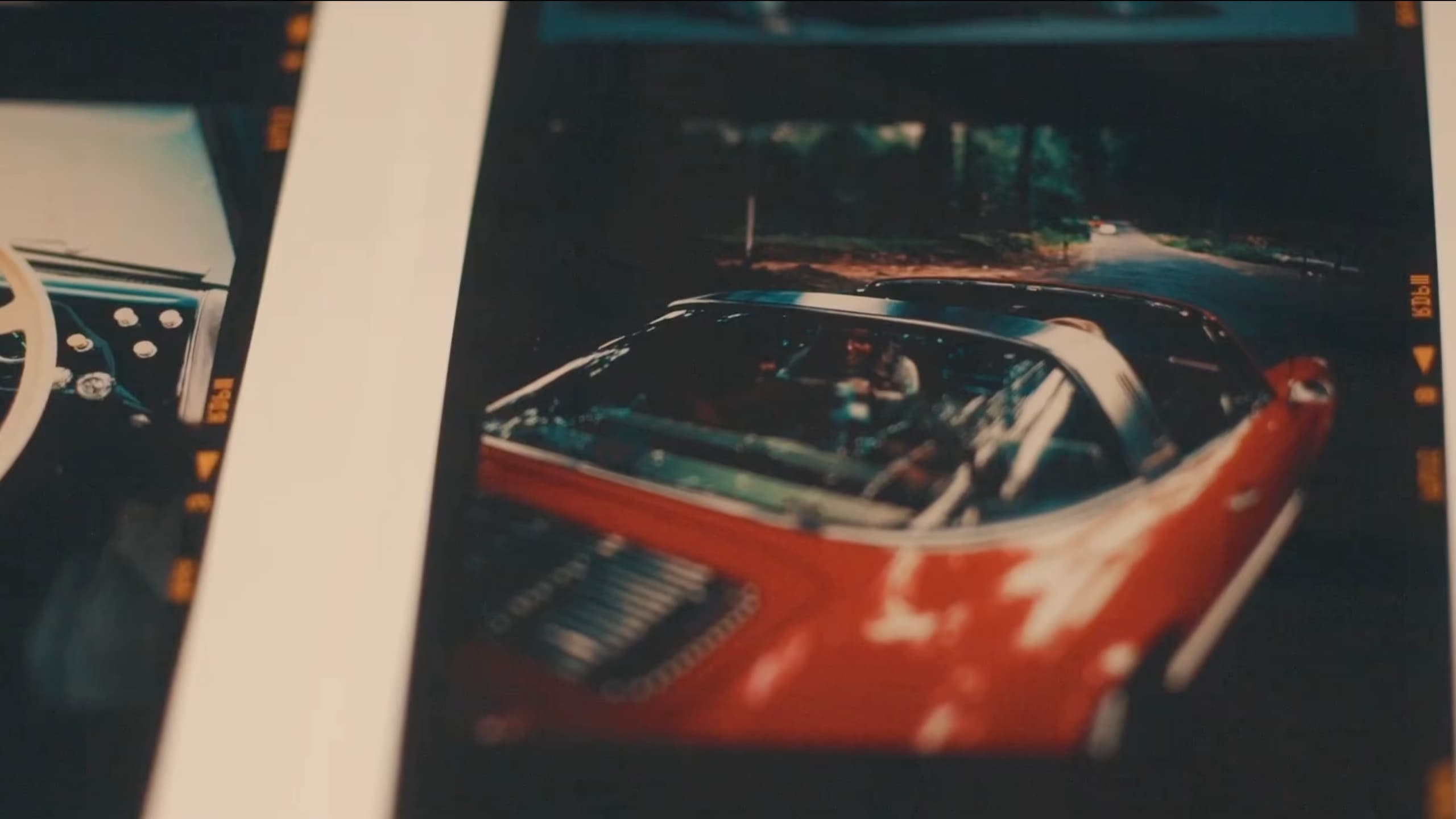 A historic red Porsche car on a photo