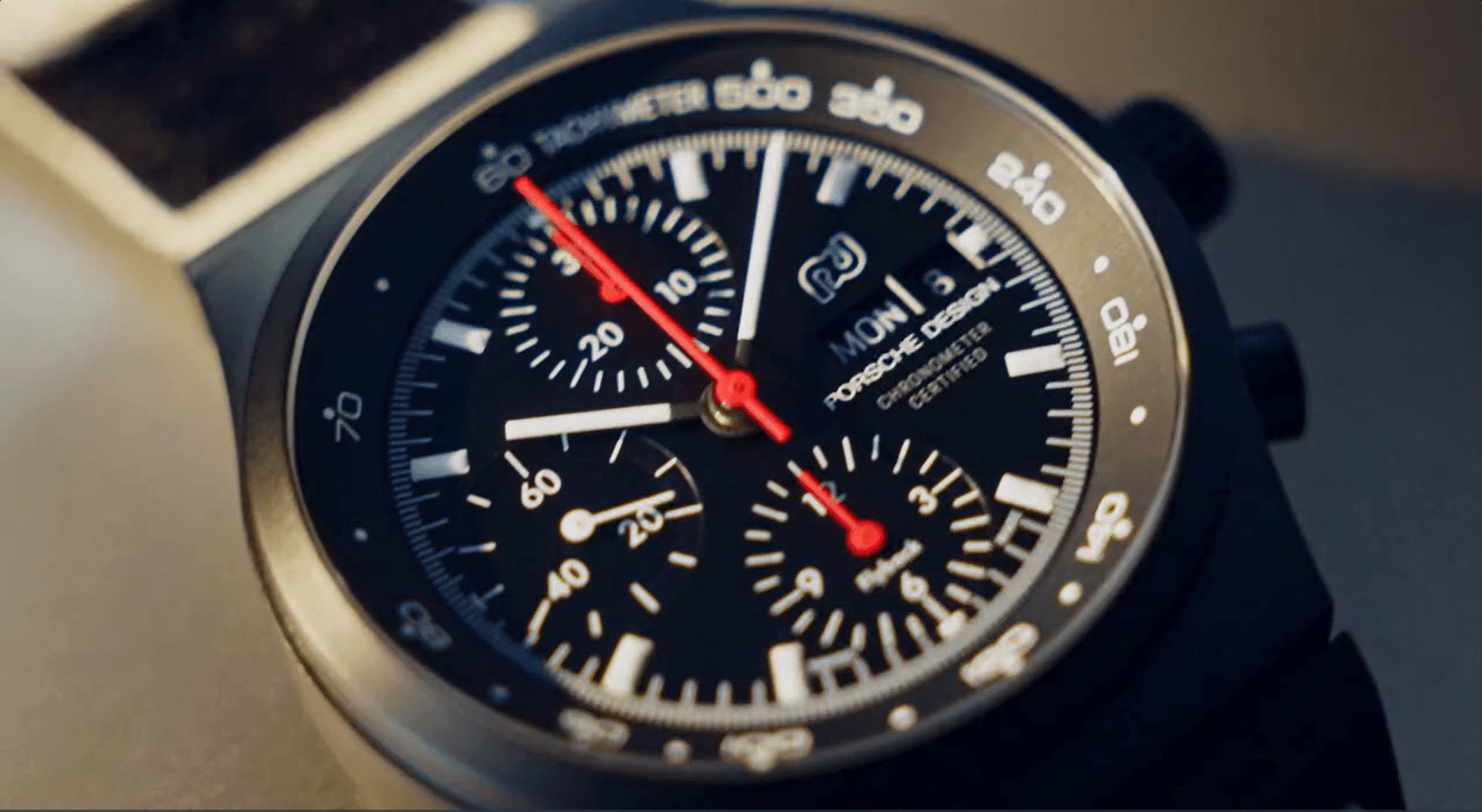 Closeup of a Porsche Design chronograph in black