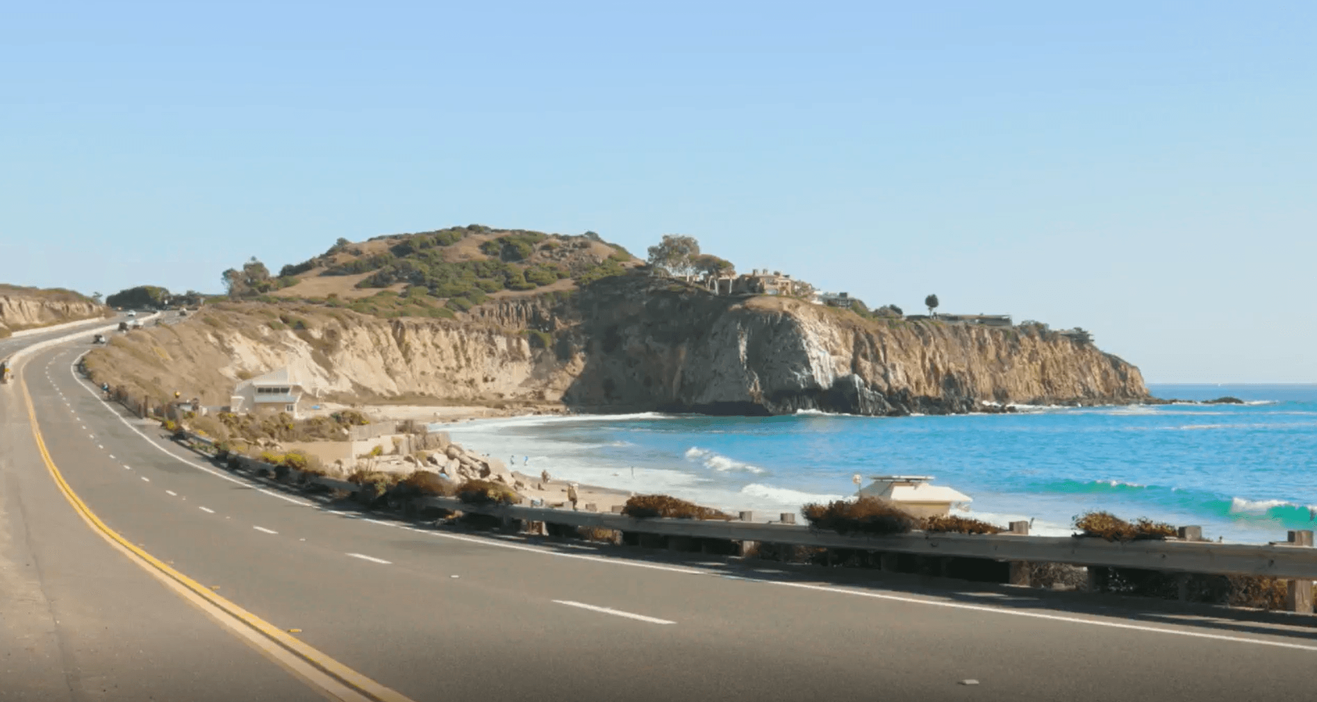 View of a street next to a coast