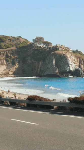 View of a street next to a coast