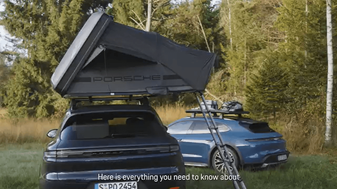 two Porsche cars next to each other in the forest with Porsche roof tent