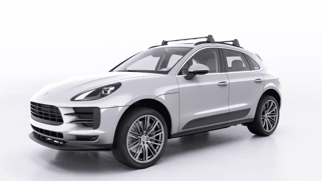 Light grey Porsche Cayenne on a white background